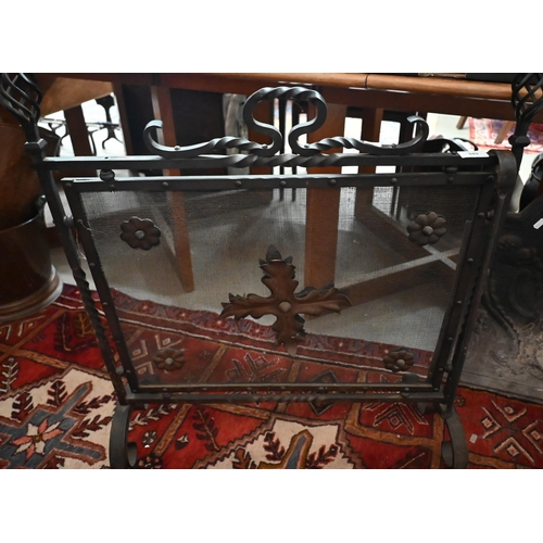 349 - # A cast iron fire back, 55 x 90 cm to/w a fire basket and girandoles, wrought iron firescreen and f... 