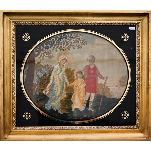 354 - A 19th century silk longstitch picture of The Holy Family, 36 x 42 cm in black glass slip and gilt f... 