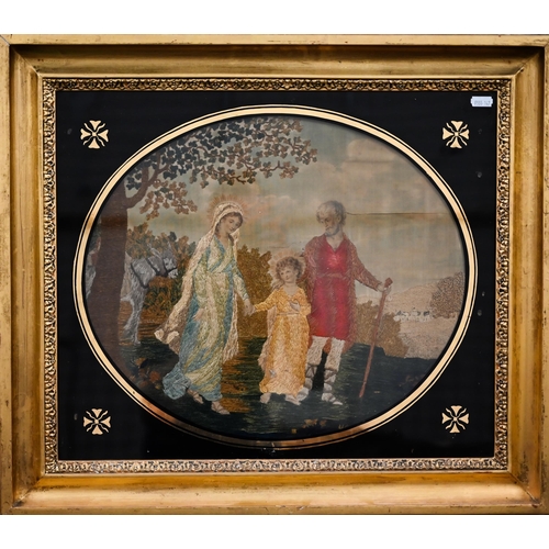 354 - A 19th century silk longstitch picture of The Holy Family, 36 x 42 cm in black glass slip and gilt f... 