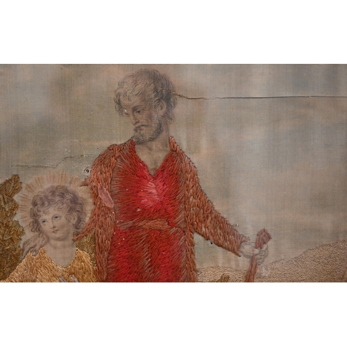 354 - A 19th century silk longstitch picture of The Holy Family, 36 x 42 cm in black glass slip and gilt f... 