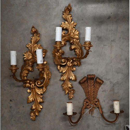 357 - Two carved giltwood twin-branch electric wall-sconces to/w a metal example (3)