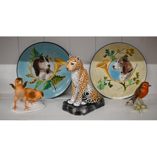 386 - A Nymphenburg porcelain group of two chicks, a Halcyon Days Leopard, Goebbels Robin and a pair of Fr... 