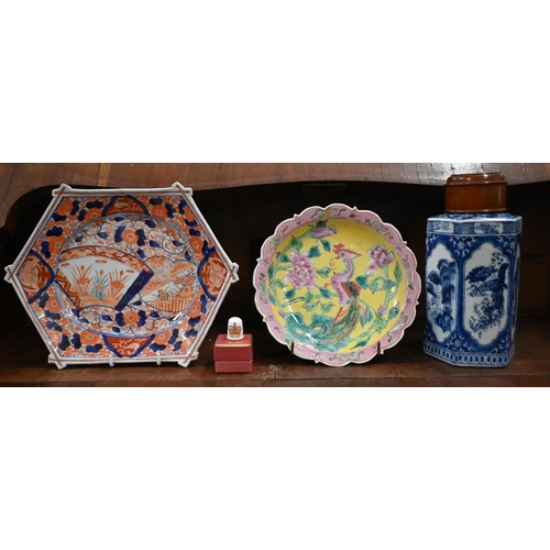 389 - A Japanese Imari octagonal plate, a Chinese yellow-ground famille rose plate, a blue and white hexag... 