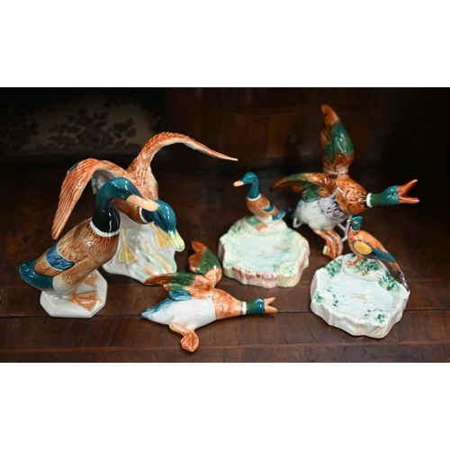 394 - A selection of Beswick pottery flying duck wall ornaments including 396-1 (25 cm long), size 2, thre... 