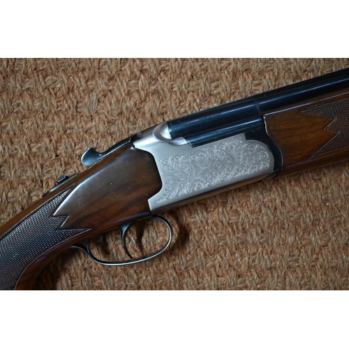 450A - A Lanber (Spain) 12 bore over and under shotgun with engraved lock and walnut stock; 70cm barrels - ... 