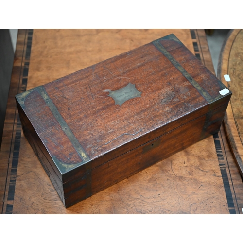 451 - A George IV brass-bound mahogany writing slope with fitted interior and base drawer, 46 cm wide