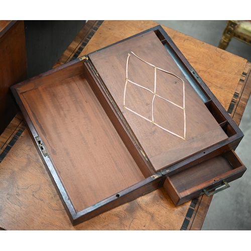 451 - A George IV brass-bound mahogany writing slope with fitted interior and base drawer, 46 cm wide