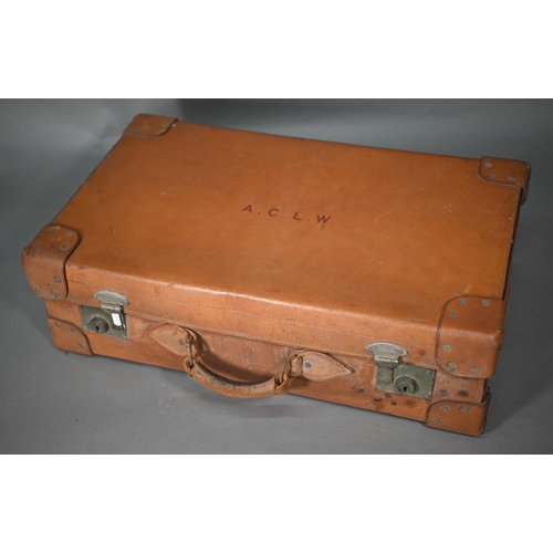 339 - A vintage pigskin suitcase with fitted interior