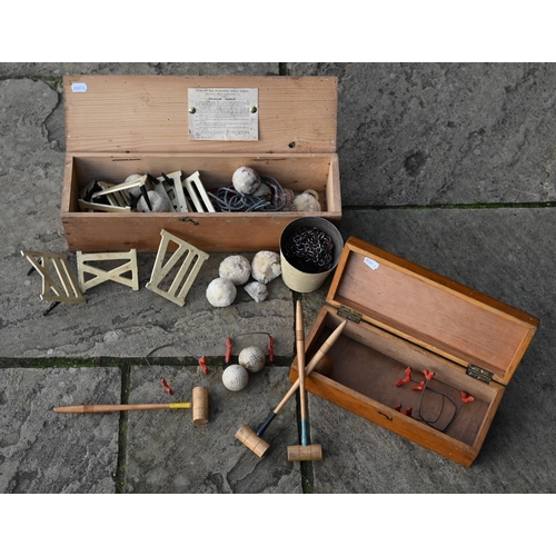 462 - A boxed Army & Navy Co-Operative Society clock golf set to/w a carpet croquet set - also boxed (... 