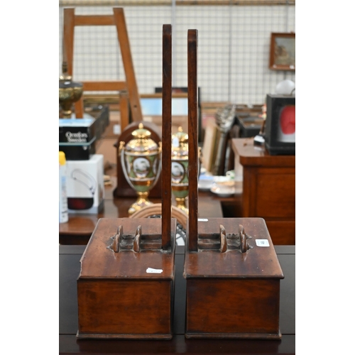 468 - A pair of antique mahogany meat-plate stands with weighted box bases, 46 x 32 cm overall
