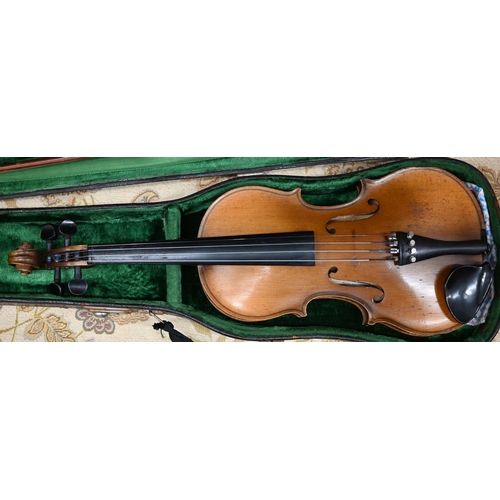 471 - A violin with 34 cm one-piece back and 'Stradivarius' label within, 56 cm overall, in case with bow