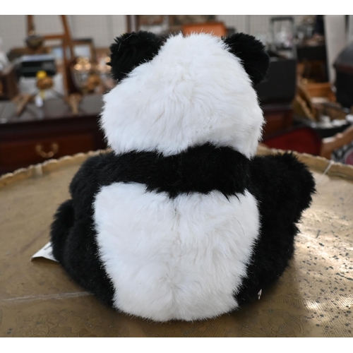 472 - A Steiff panda, 25 cm high (seated)