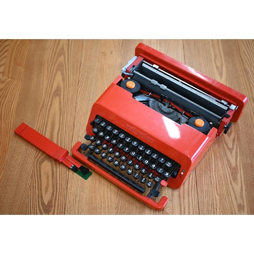 486 - A 1960s red plastic Olivetti Valentine portable typewriter, designed by Ettore Sottsass & Perry ... 