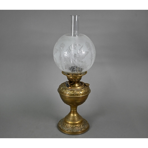 488 - A Victorian brass oil lamp with etched glass shade and patent Duplex burner