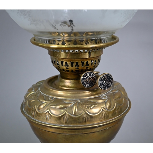 488 - A Victorian brass oil lamp with etched glass shade and patent Duplex burner