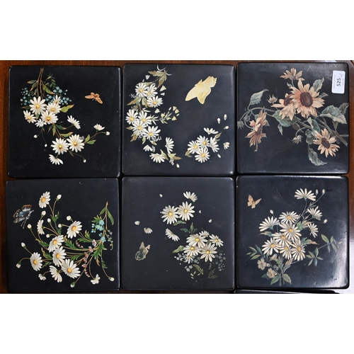 525 - Seven Continental black-laquered and papier mache trinket boxes, with floral printed and painted dec... 