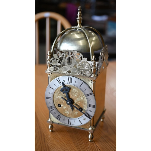 528 - A brass reproduction lantern clock with twin-train movement, 33 cm high