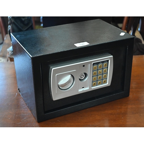 530 - A small safe with digital combination lock (master key in office), 31 x 20 x 20 cm