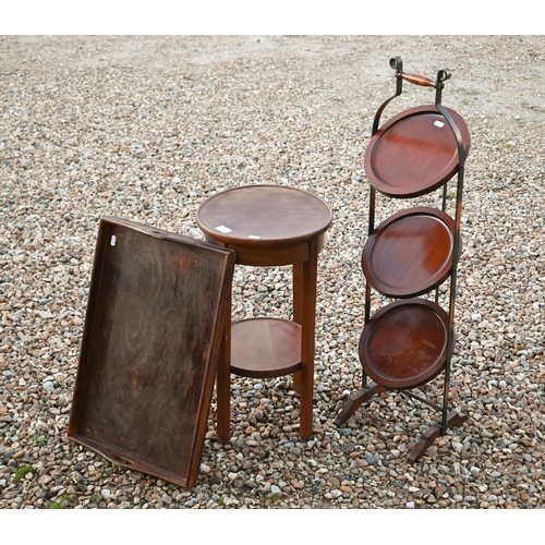 539 - An antique 'John Watts' three-tier folding cake stand to/w two-tier plant stand and oak tray (3)