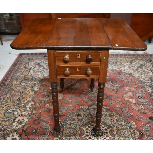 549 - A 19th century mahogany drop leaf end table with two drawers and opposing dummy drawers raised on tu... 