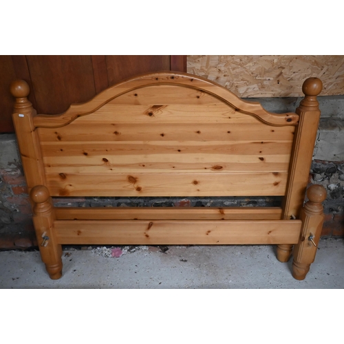 550 - # A stained pine double bed frame, 150 cm wide