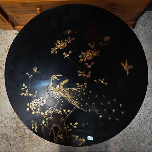 61 - A Japanned circular occasional table lacquered and gilded with kacho-ga (bird and flowers) decoratio... 