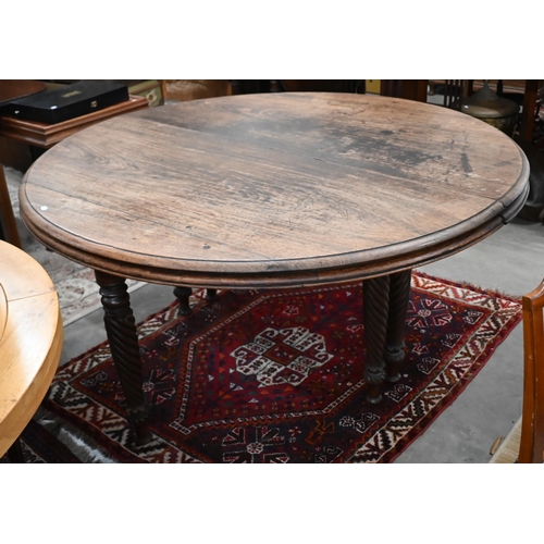 66 - A 19th century mahogany circular campaign dining table on spiral turned supports (can be separated/u... 