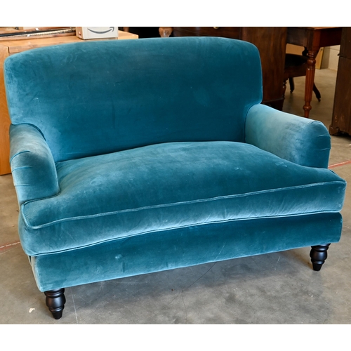 75 - A Howard stye love seat in peacock blue velour fabric, ebonised turned front supports, 140 x 100 x 9... 