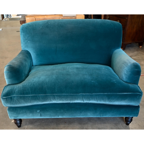 75 - A Howard stye love seat in peacock blue velour fabric, ebonised turned front supports, 140 x 100 x 9... 