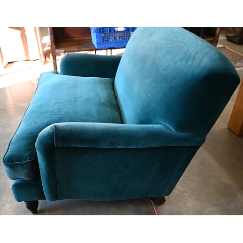 75 - A Howard stye love seat in peacock blue velour fabric, ebonised turned front supports, 140 x 100 x 9... 