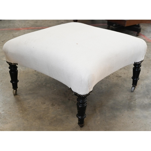 78 - A Victorian foot stool of convexed square form with off-white linen upholstery and ebonised turned s... 