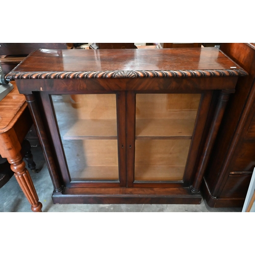 8 - A Victorian mahogany bookcase with glazed doors between turned columns, raised on plinth base, 104 c... 
