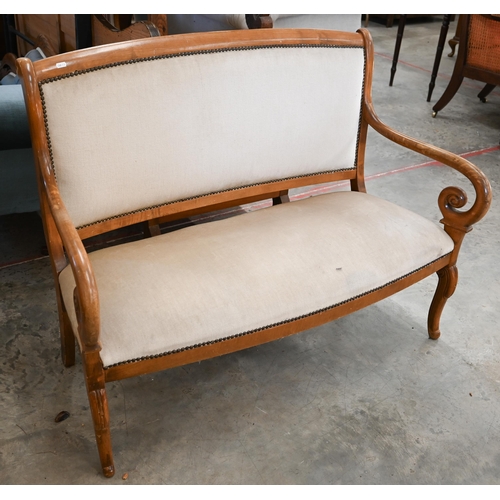 90 - # A stained beech framed salon settee with open scroll arms, champagne dralon upholstery