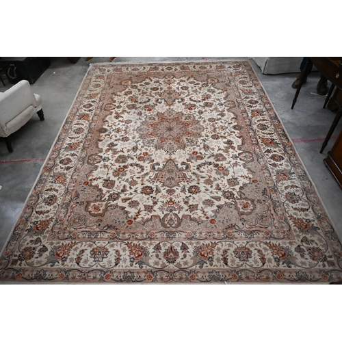 91 - A Chinese cream ground carpet with traditional Persian sylised floral design, 356 x 256 cm (treated ... 