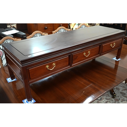 92 - A 20th century Chinese stained hardwood rectangular coffee table with three drawers, 150 x 50 x 44 c... 