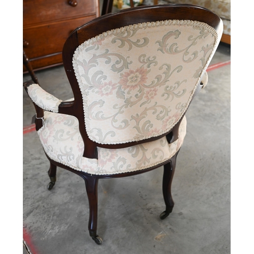 95 - A French Louis XV style fauteuil armchair with foliate upholstery