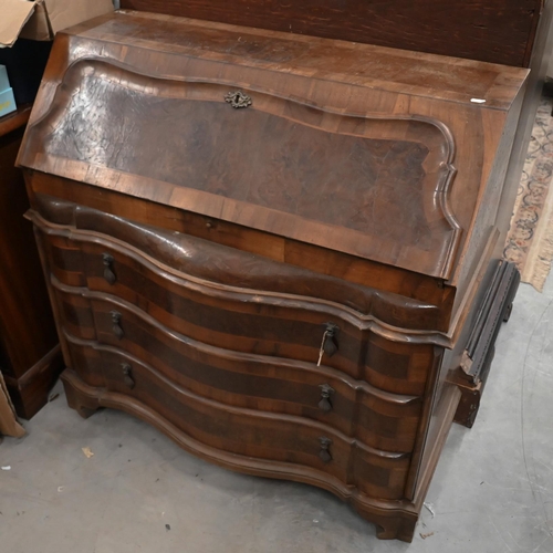 99 - # An antique Continental walnut fall front bureau with three long drawers standing on shaped bracket... 