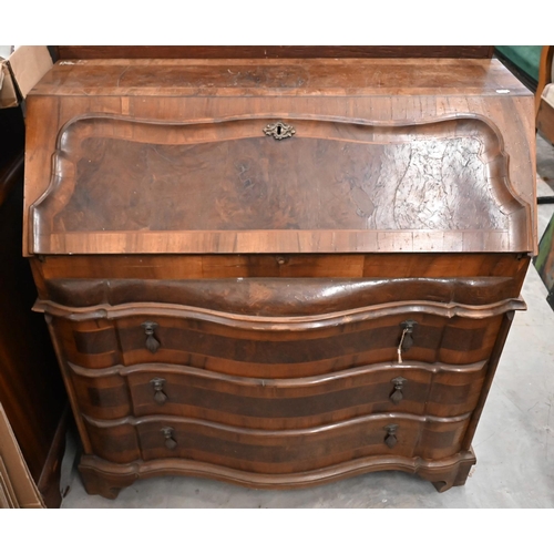 99 - # An antique Continental walnut fall front bureau with three long drawers standing on shaped bracket... 