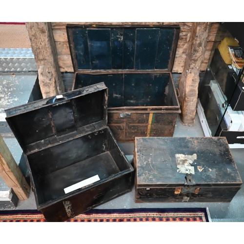 556 - A stack of three antique and later japanned steel military uniform trunks, all a/f (3)