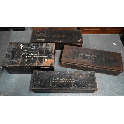 559 - Four assorted antique japanned steel military uniform trunks, variously labelled A. Greenwell Lax.; ... 