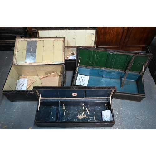 559 - Four assorted antique japanned steel military uniform trunks, variously labelled A. Greenwell Lax.; ... 