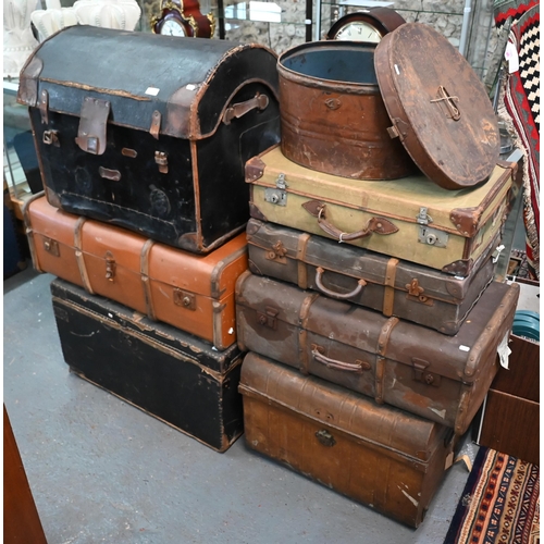 563 - Various assorted vintage leather, canvas and fabric clad wood luggage trunks, suit cases and a large... 