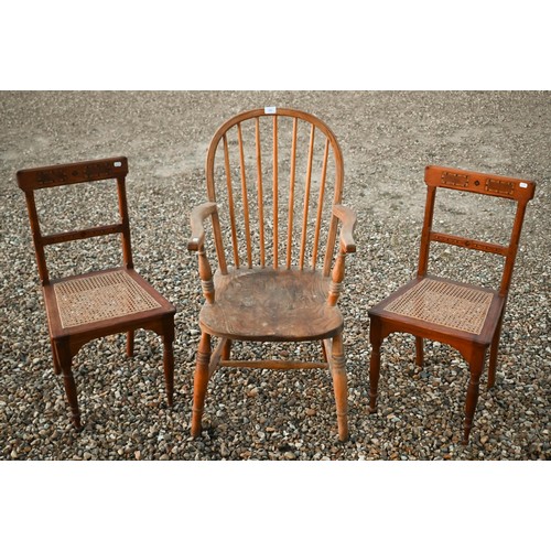 151 - A pair of late Victorian Aesthetic movement pitch pine side chairs with marquetry inlays, caned seat... 