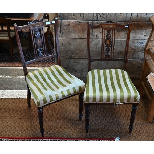 554 - # A pair of Edwardian Sheraton Revival inlaid satinwood salon side chairs, the striped silk seats  a... 