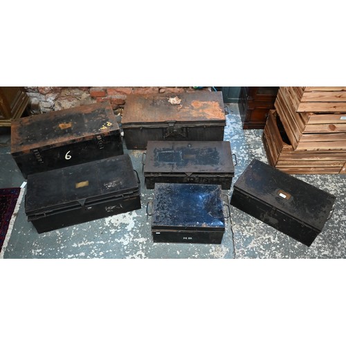 564 - Six assorted antique and later black japanned steel military and other uniform trunks, variously lab... 