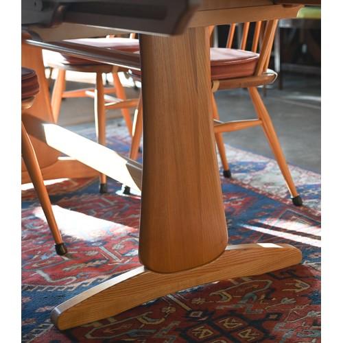 1 - A modern Ercol Grand Windsor ash extending dining table with three optional central leaves (model 11... 