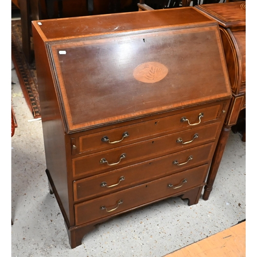 69 - #A Sheraton Revival cross-banded and inlaid satinwood bureau, with fitted interior over four long gr... 