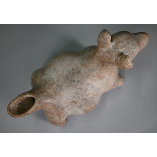 409 - A Mexican earthenware replica Colima Dog ritualistic ewer, 29 cm long (cracked beneath) to/w a 29.5 ... 