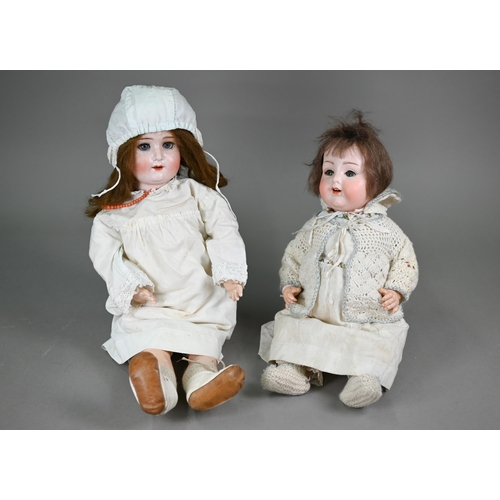 441 - An Armand Marseille 990 A5M bisque-headed baby doll with cropped brown wig, closing blue eyes and op... 