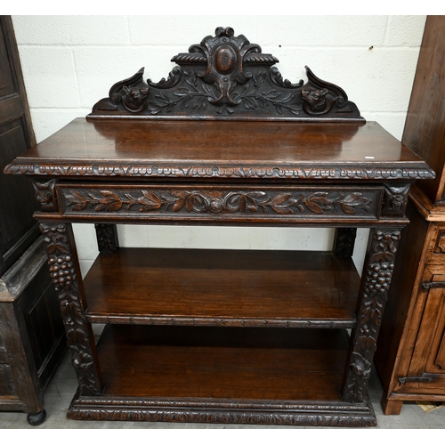 132 - A late Victorian Irish carved oak buffet with raised back, single drawer and open shelves, 120 x 52 ... 